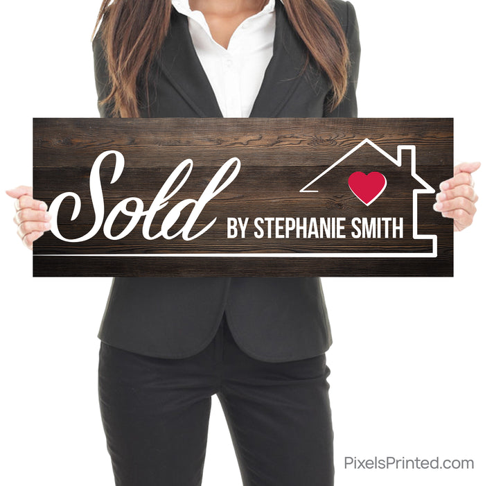real estate agent closing day sold by photo sign