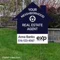 eXp Realty house shaped yard sign promoting a neighborhood real estate agent and local market presence.