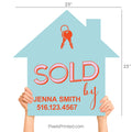 Minimalist white house-shaped sign with black Sold By text held by a real estate agent.