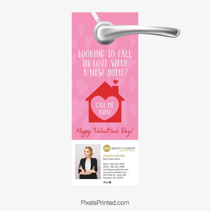Realty ONE Group Valentine-themed door hanger asking “Looking to fall in love with a new home?”