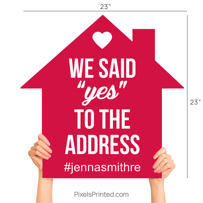 House-shaped photo prop for realtors with the phrase Said Yes to the Address.
