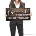 real estate agent closing photo sold sign