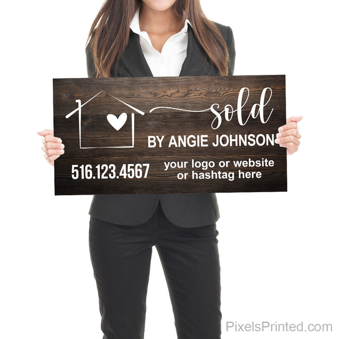 real estate agent closing photo sold sign