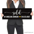 realtor closing photo sign with homeowners