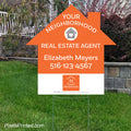 Next Home agent house shaped yard sign neighborhood farming